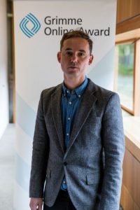 Bastian Asdonk von „Germania“ bei der Bekanntgabe der Nominierungen zum Grimme Online Award. Foto: Grimme-Institut / Arkadiusz Goniwiecha